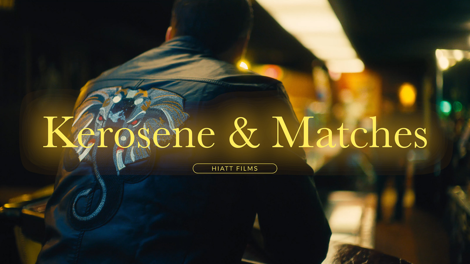 Moody cinematic scene of man seated at bar filmed for narrative short film by Hiatt Films